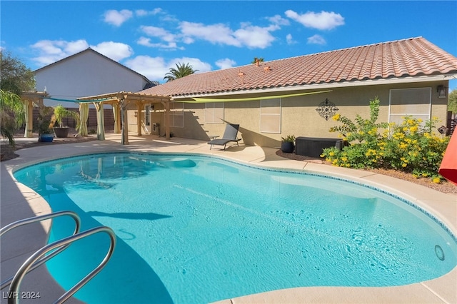 view of pool featuring a patio and a pergola