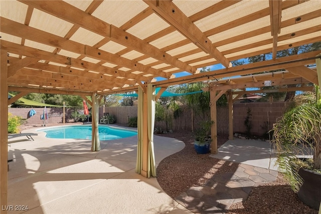 view of pool featuring a patio area and a pergola