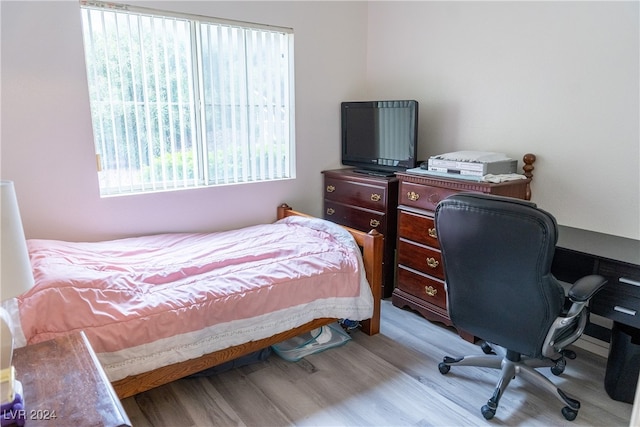 bedroom featuring light hardwood / wood-style flooring