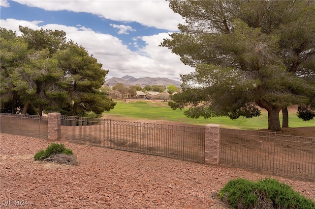 view of property's community featuring a mountain view and a lawn