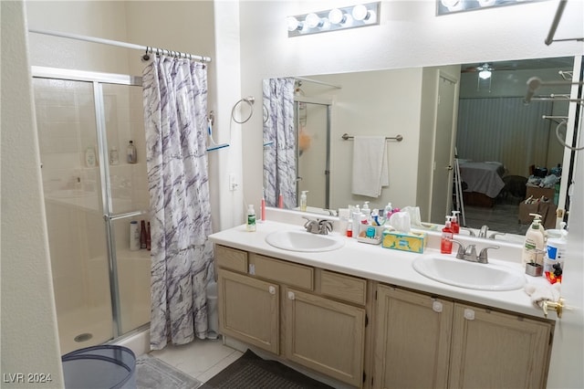 bathroom featuring vanity, ceiling fan, a shower with curtain, and tile patterned flooring