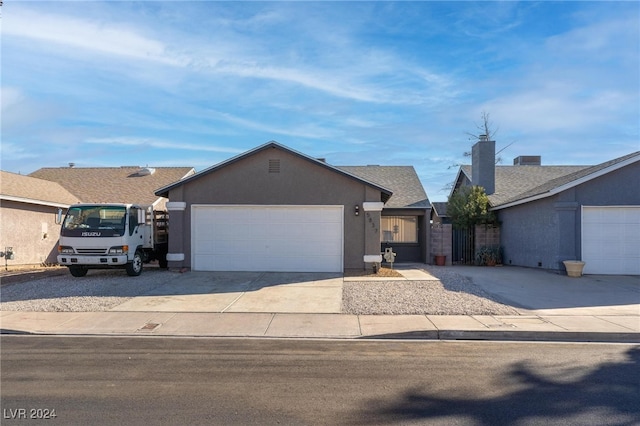 single story home with a garage