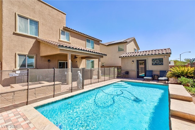 view of pool featuring a patio