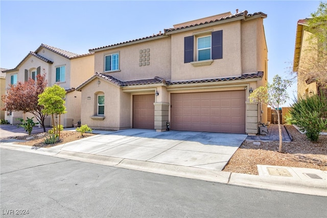 view of front of property with a garage