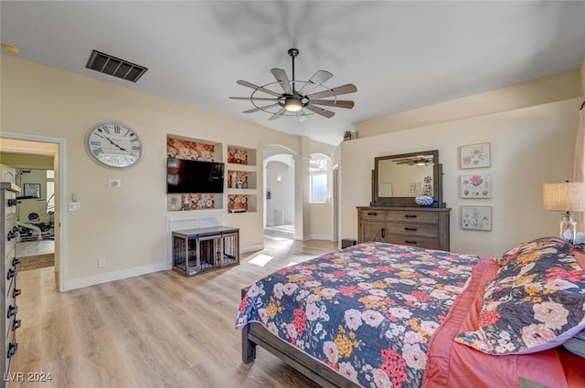 bedroom featuring light hardwood / wood-style floors and ceiling fan