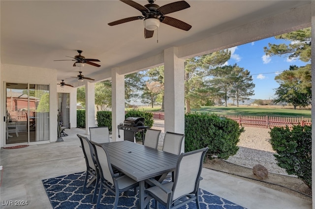 view of patio / terrace featuring ceiling fan and grilling area