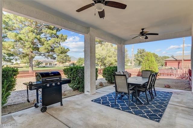 view of patio / terrace with ceiling fan and grilling area