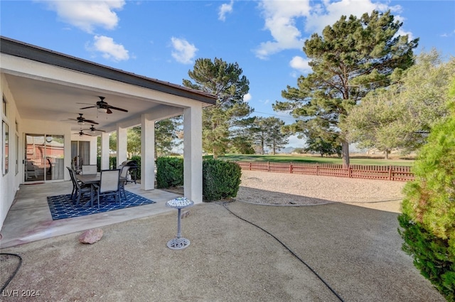 view of patio / terrace featuring ceiling fan