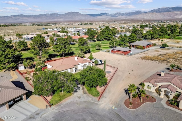 bird's eye view with a mountain view