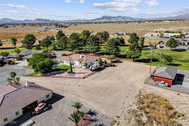 drone / aerial view featuring a mountain view