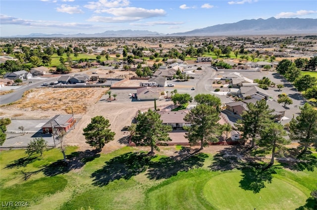 birds eye view of property featuring a mountain view