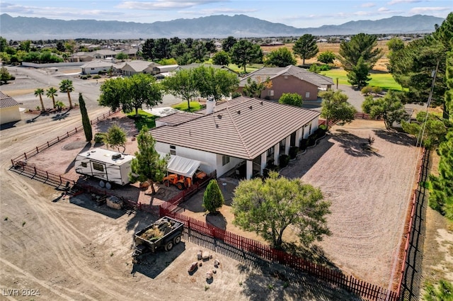 drone / aerial view featuring a mountain view