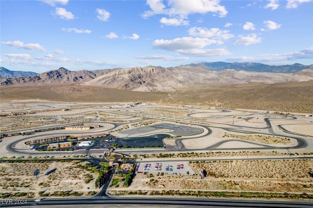 drone / aerial view featuring a mountain view