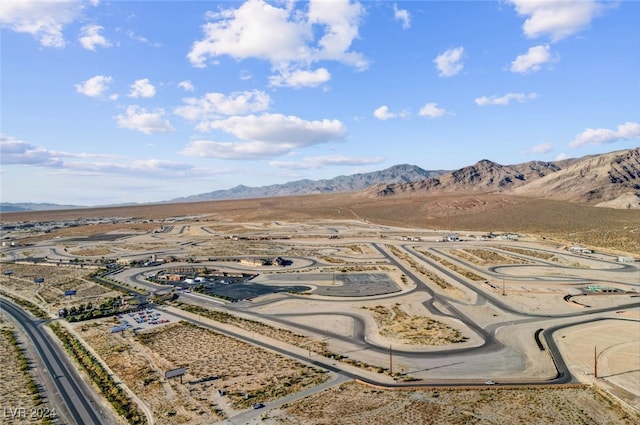 drone / aerial view featuring a mountain view