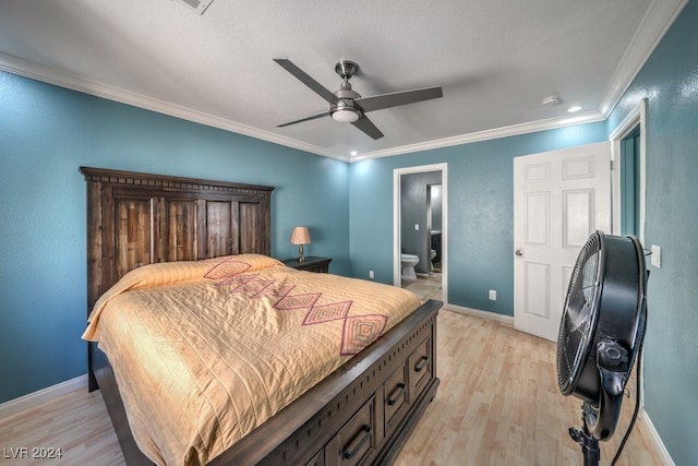 bedroom with connected bathroom, ceiling fan, crown molding, and light wood-type flooring