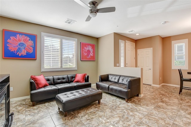 living room featuring ceiling fan