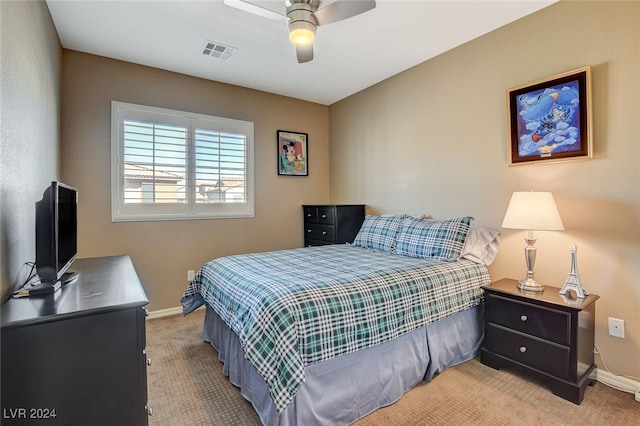 carpeted bedroom with ceiling fan