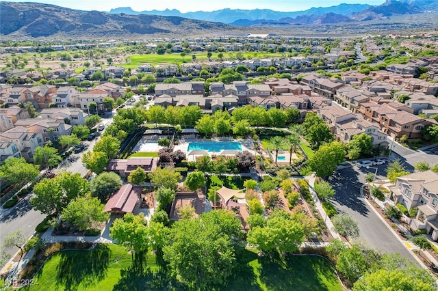 birds eye view of property featuring a mountain view