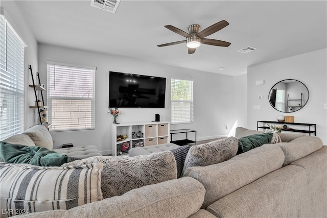 living room featuring ceiling fan