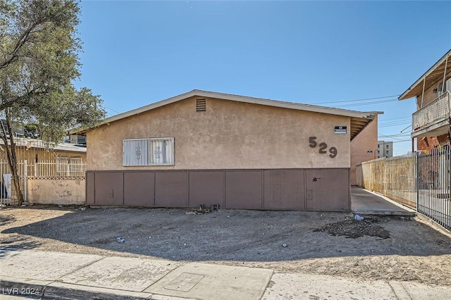529 Mckellar Cir, Las Vegas, NV 89119 - view of home's exterior featuring stucco siding and fence