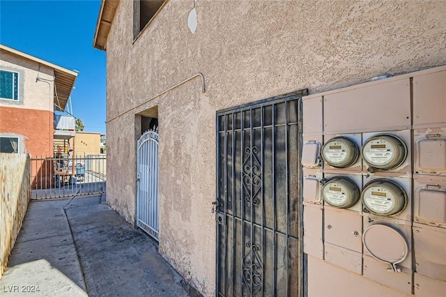 529 Mckellar Cir, Las Vegas, NV 89119 - exterior space featuring electric meter and stucco siding
