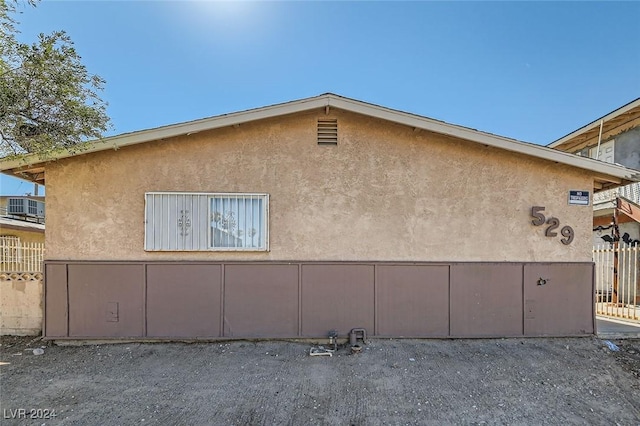529 Mckellar Cir, Las Vegas, NV 89119 - view of home's exterior featuring stucco siding and cooling unit