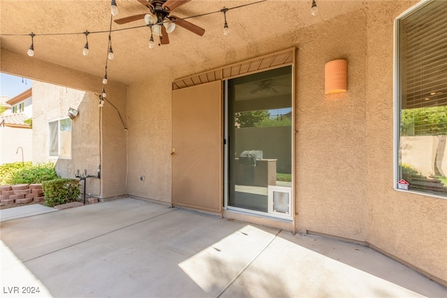 view of patio with ceiling fan