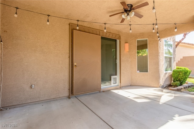 view of patio / terrace featuring ceiling fan