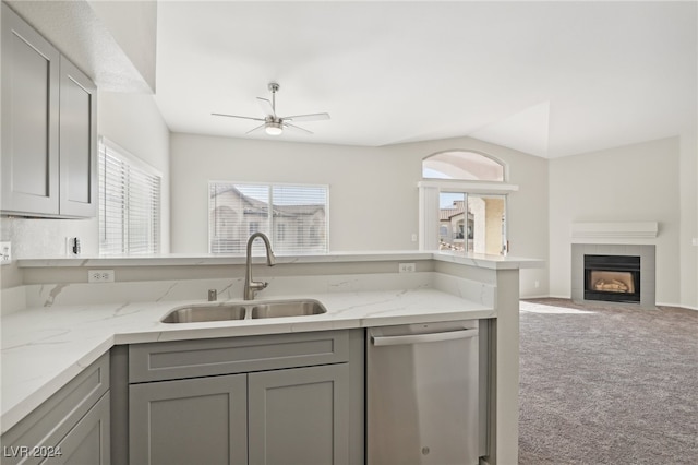 kitchen with gray cabinetry, carpet, sink, and dishwasher