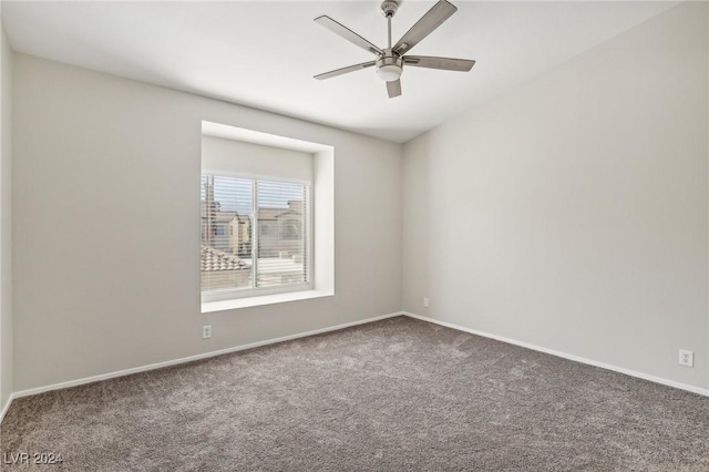 4811 Black Bear Rd Unit 201, Las Vegas, NV 89149 - carpeted spare room featuring baseboards and a ceiling fan