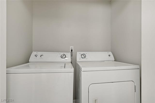 4811 Black Bear Rd Unit 201, Las Vegas, NV 89149 - washroom featuring separate washer and dryer