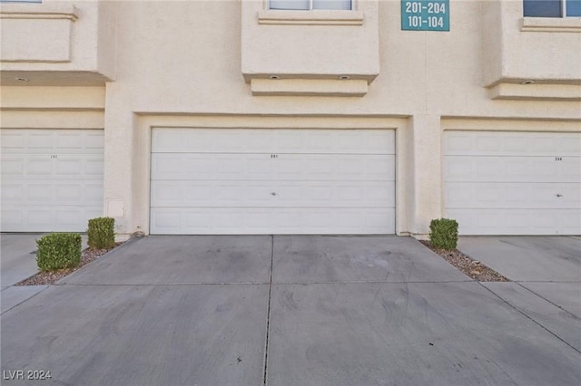 4811 Black Bear Rd Unit 201, Las Vegas, NV 89149 - garage featuring concrete driveway