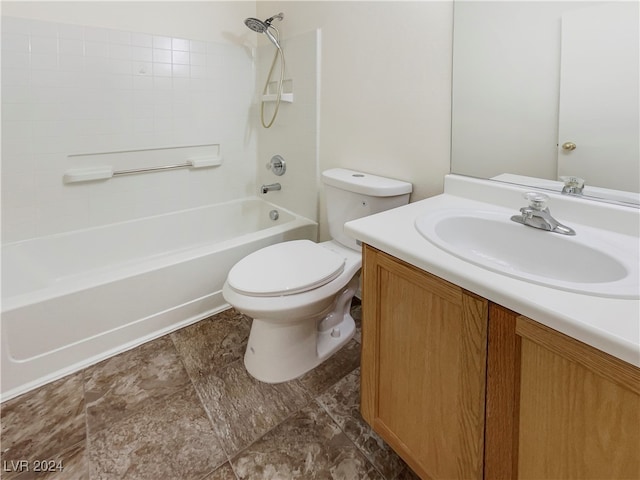 full bathroom with vanity, toilet, and shower / washtub combination