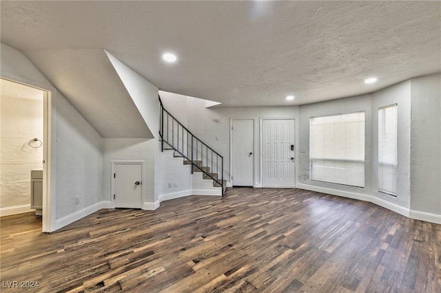 foyer featuring dark wood-type flooring