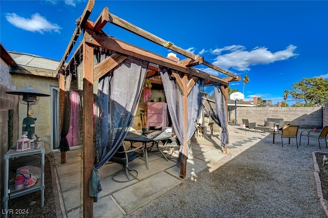 view of patio / terrace featuring a pergola