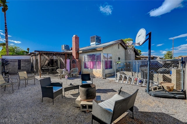 view of patio / terrace with a gazebo and cooling unit