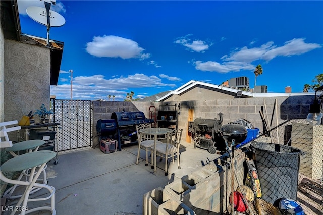 view of patio with central AC