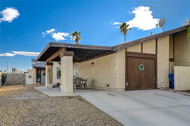 view of front of property with a patio