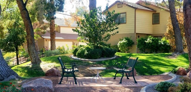 exterior space with a yard and a patio