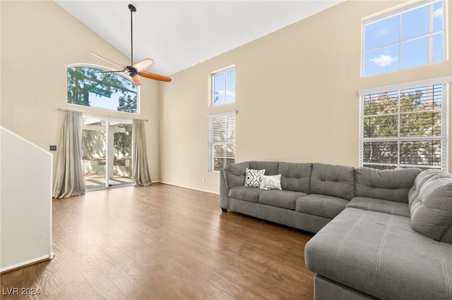 living room with high vaulted ceiling, wood-type flooring, and ceiling fan