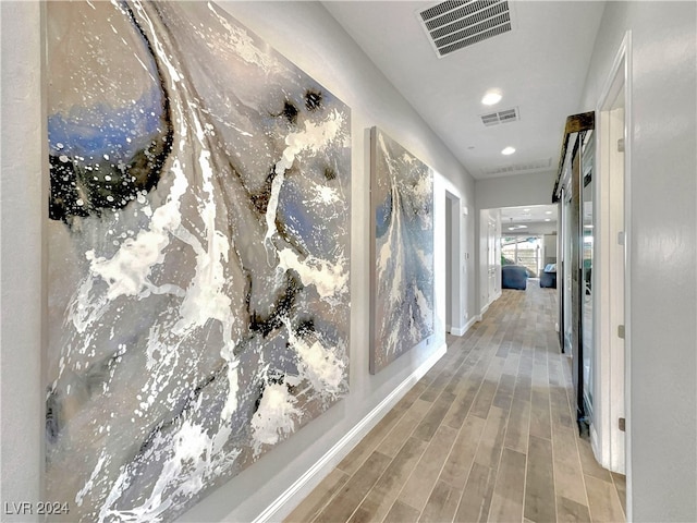 hallway featuring light hardwood / wood-style floors