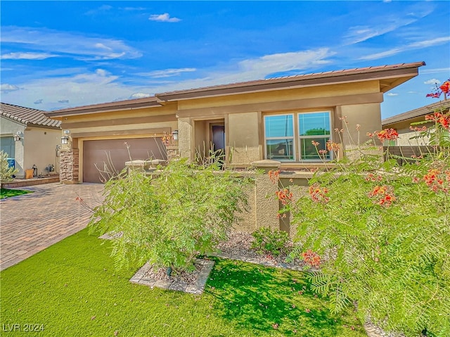 view of front of property featuring a garage