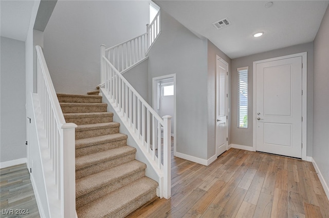 foyer with light hardwood / wood-style flooring