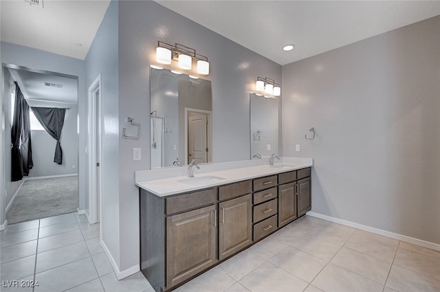 bathroom featuring vanity and tile patterned flooring