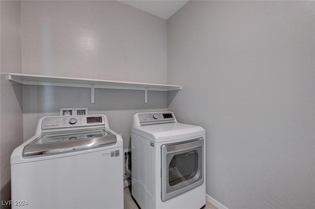 laundry area with washer and dryer