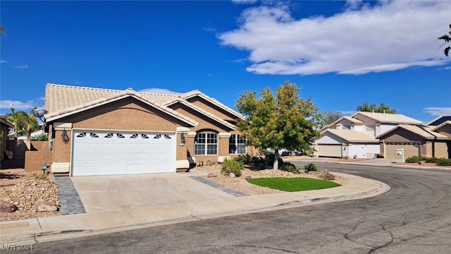 view of front of property with a garage