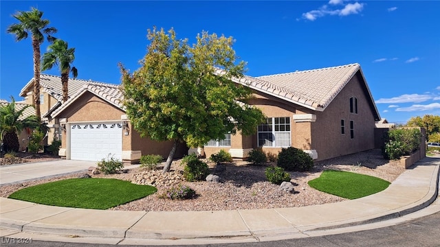 single story home with a garage