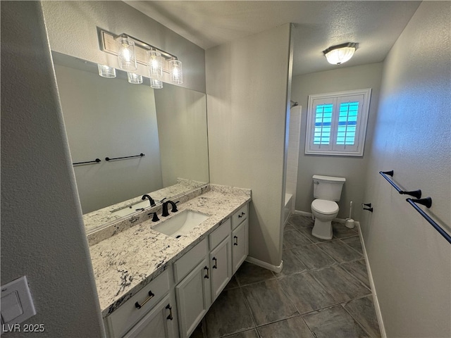 full bathroom with vanity, toilet, tub / shower combination, and tile patterned flooring