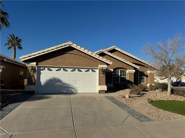 ranch-style home with a garage