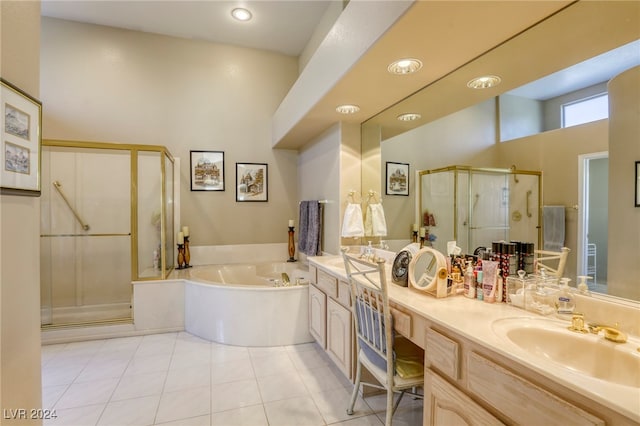 bathroom featuring vanity, tile patterned floors, a high ceiling, and plus walk in shower